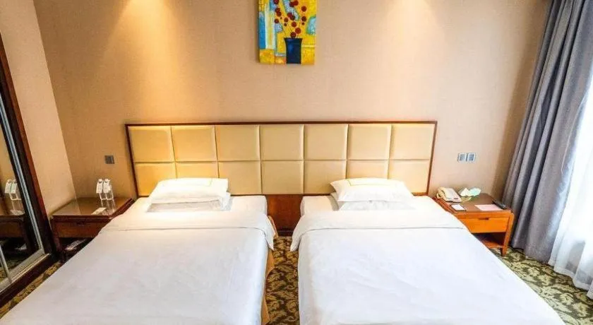 Bed in Xiamen Fortune Hotel