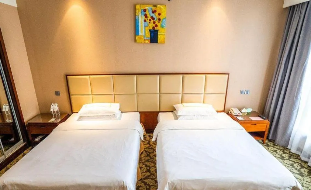 Bed in Xiamen Fortune Hotel