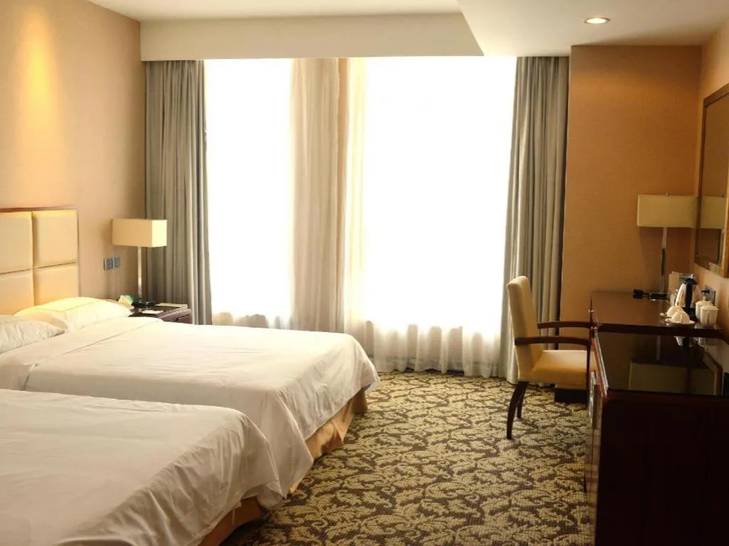 Bed in Xiamen Fortune Hotel