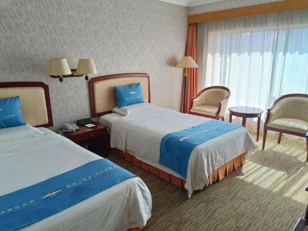 Bed in Dalian Zhongshan Hotel