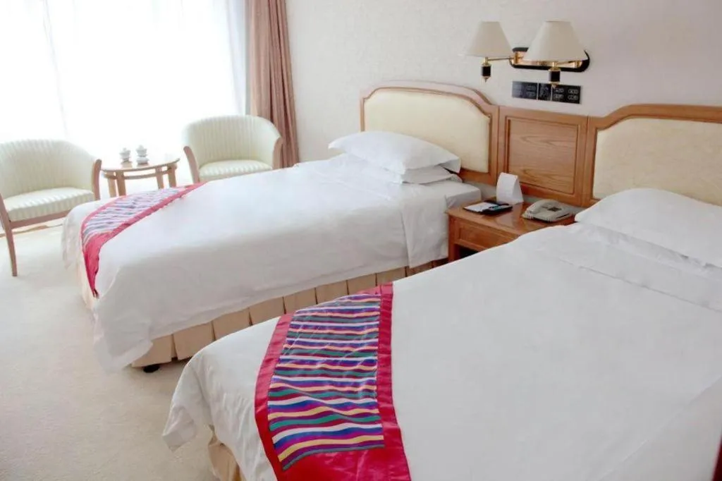 Bed in Dalian Zhongshan Hotel