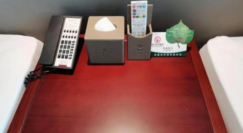 Bed in Yiyang Huatian Hotel