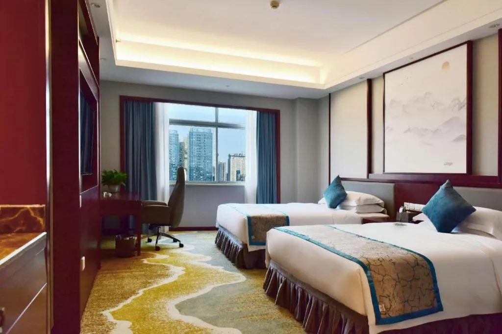 Bed in Yiyang Huatian Hotel