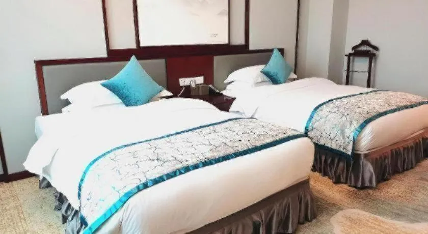 Bed in Yiyang Huatian Hotel