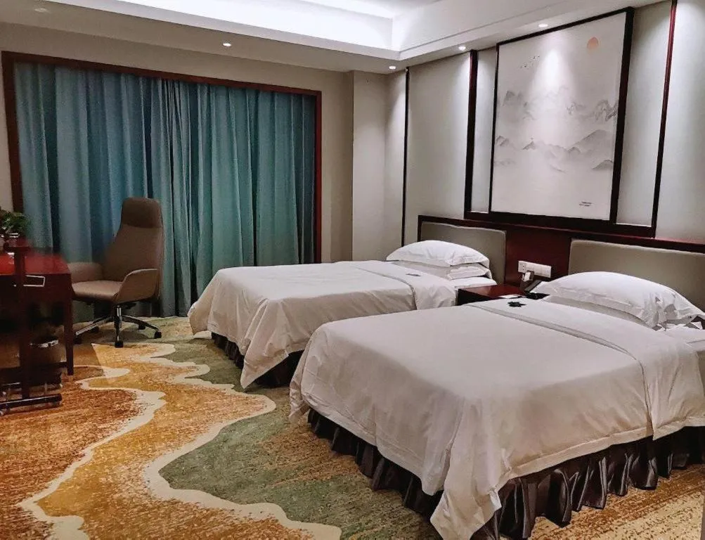 Bed in Yiyang Huatian Hotel
