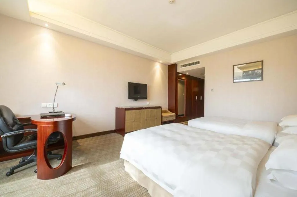 Bed in Yiyang Huatian Hotel