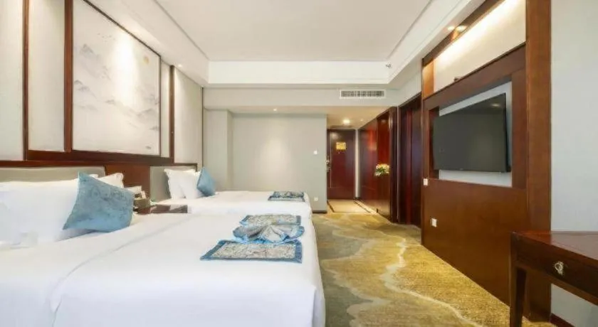 Bed in Yiyang Huatian Hotel