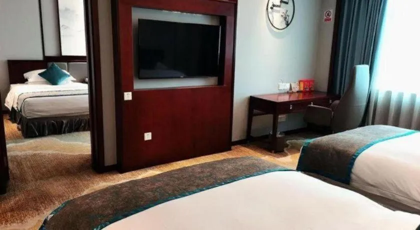 Bed in Yiyang Huatian Hotel