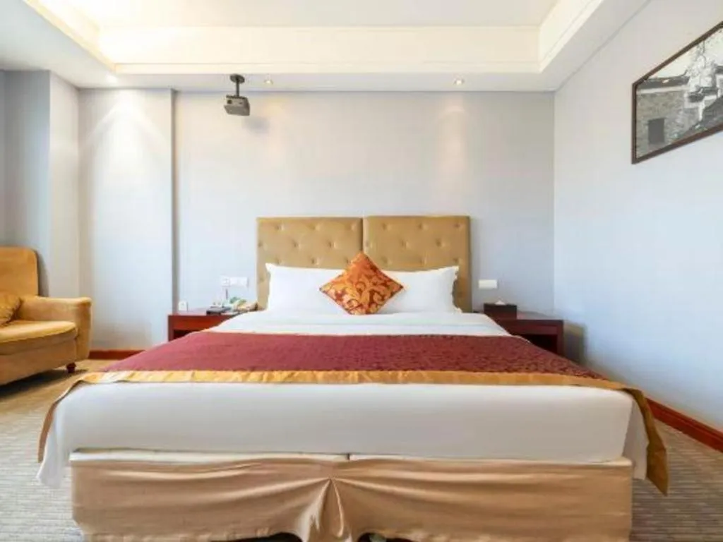 Bed in Yiyang Huatian Hotel