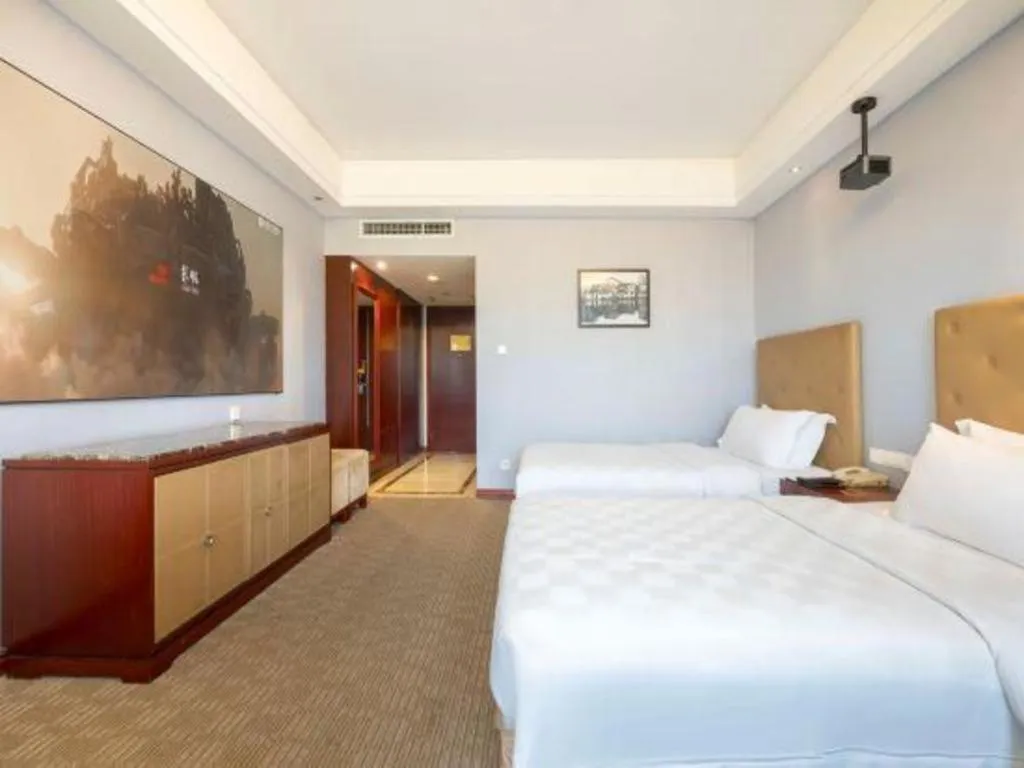 Bed in Yiyang Huatian Hotel
