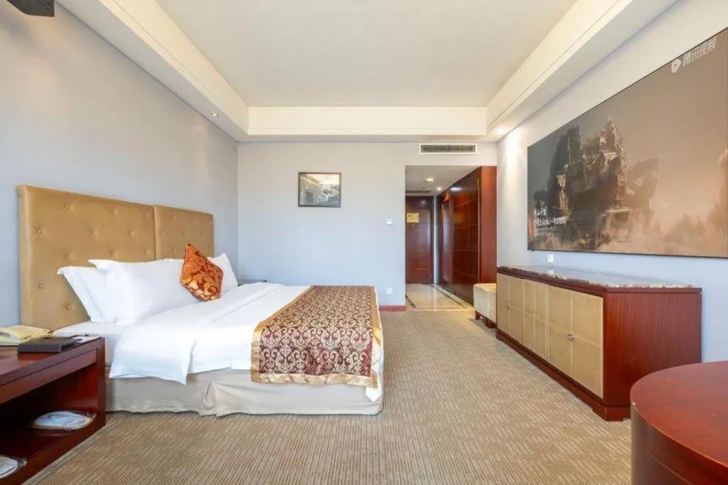 Bed in Yiyang Huatian Hotel