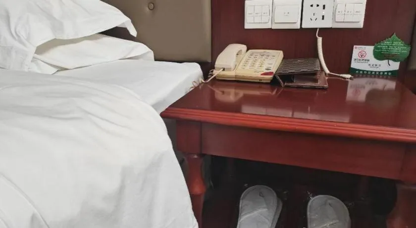 Bed in Yiyang Huatian Hotel