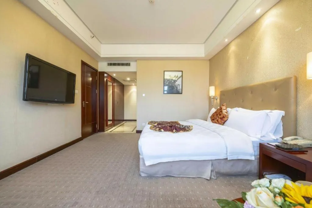 Bed in Yiyang Huatian Hotel