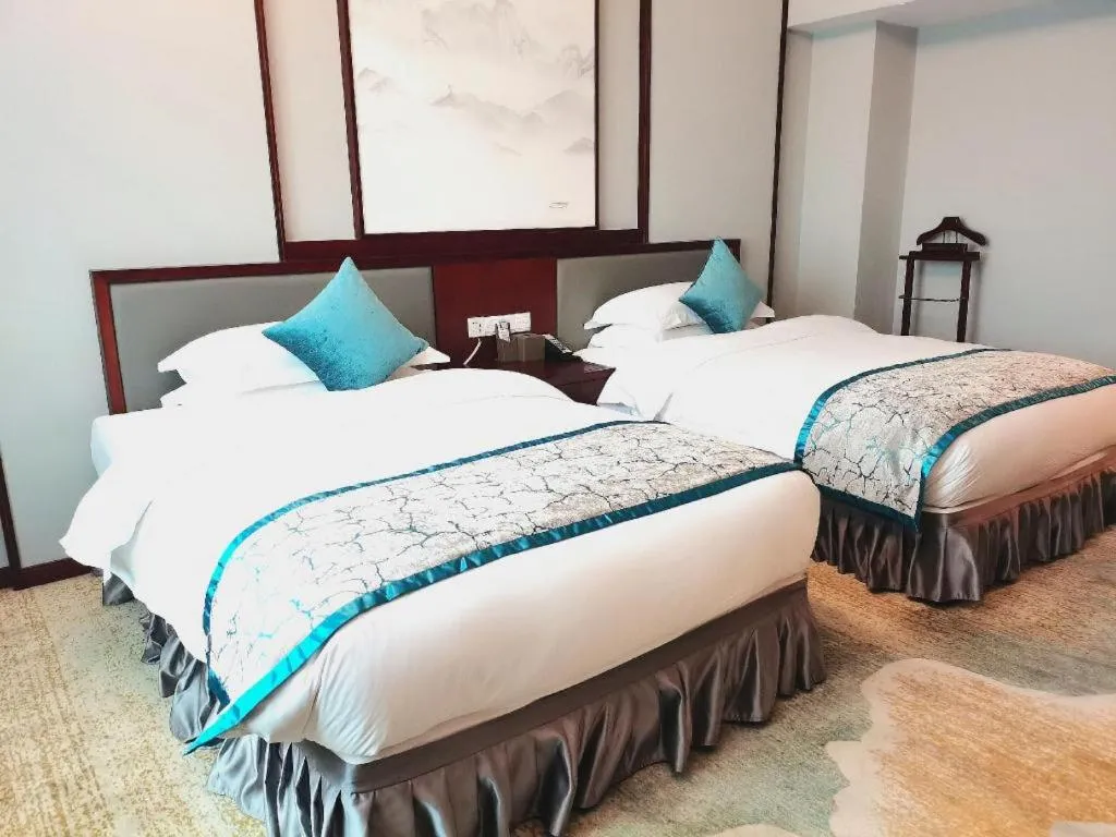 Bed in Yiyang Huatian Hotel