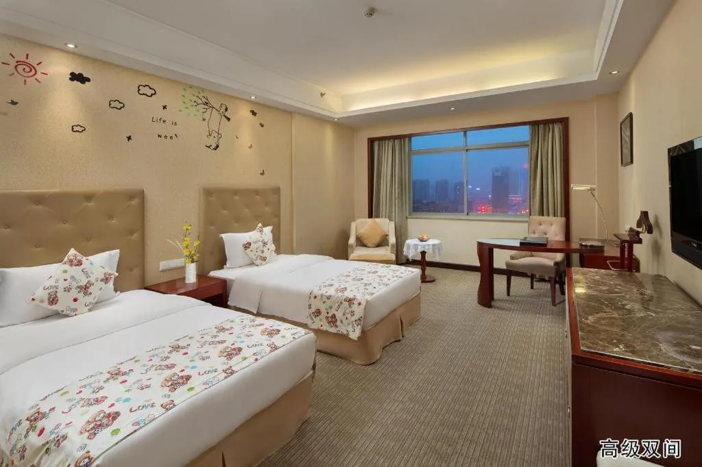 Bed in Yiyang Huatian Hotel