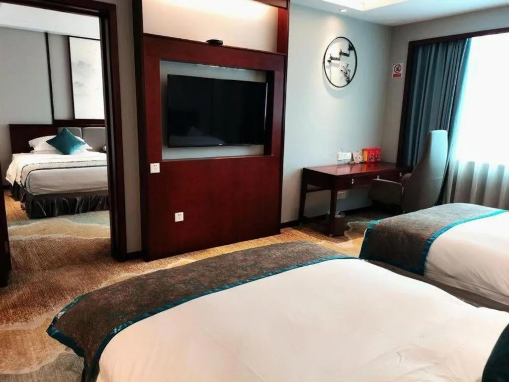 Bed in Yiyang Huatian Hotel