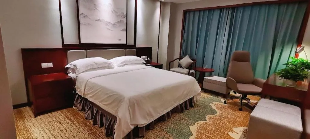Bed in Yiyang Huatian Hotel