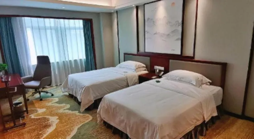 Bed in Yiyang Huatian Hotel