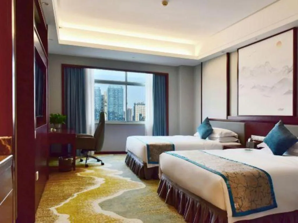 Bed in Yiyang Huatian Hotel