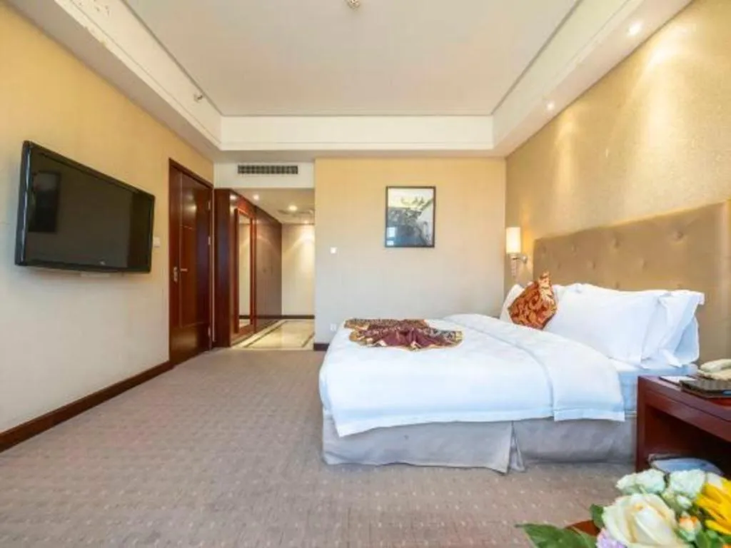Bed in Yiyang Huatian Hotel