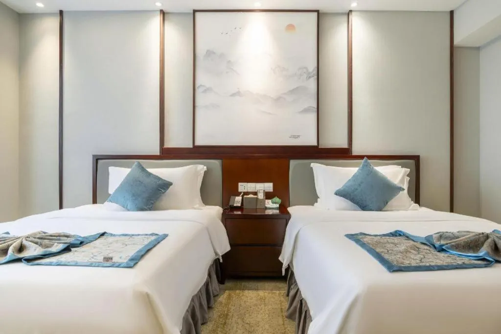 Bed in Yiyang Huatian Hotel