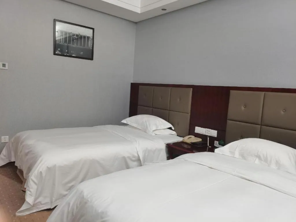 Bed in Yiyang Huatian Hotel