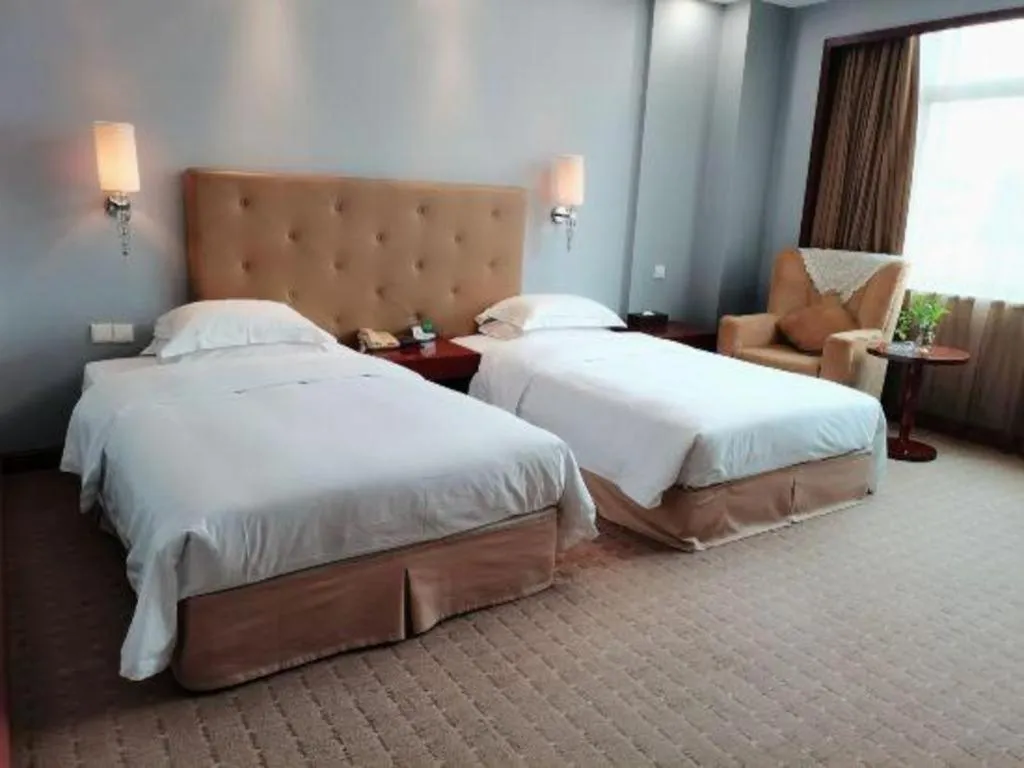 Bed in Yiyang Huatian Hotel