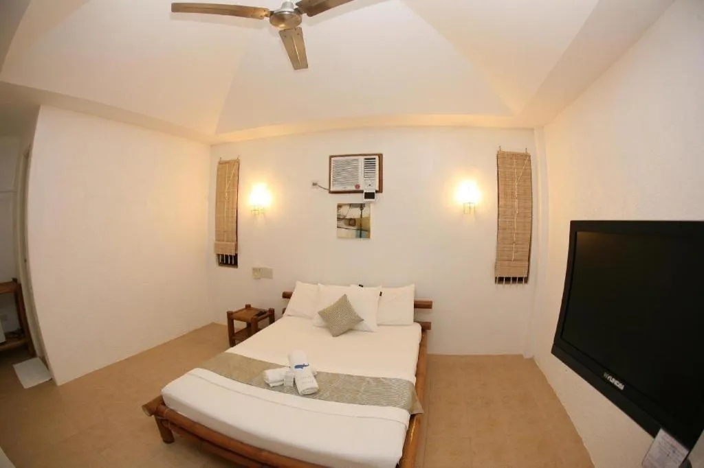 Bed in Elysia Beach Resort