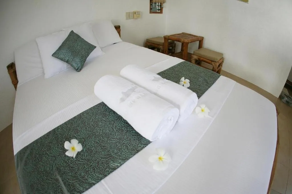 Bed in Elysia Beach Resort