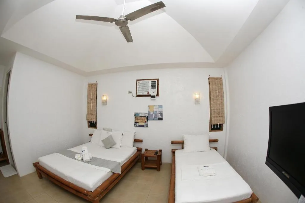 Bed in Elysia Beach Resort