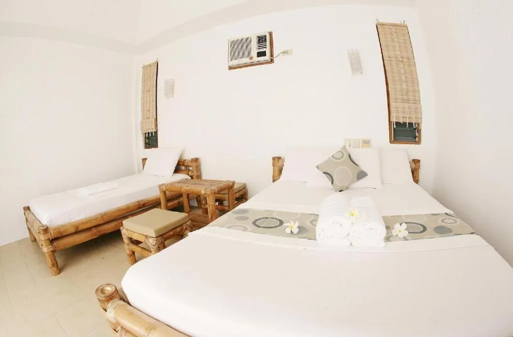 Bed in Elysia Beach Resort