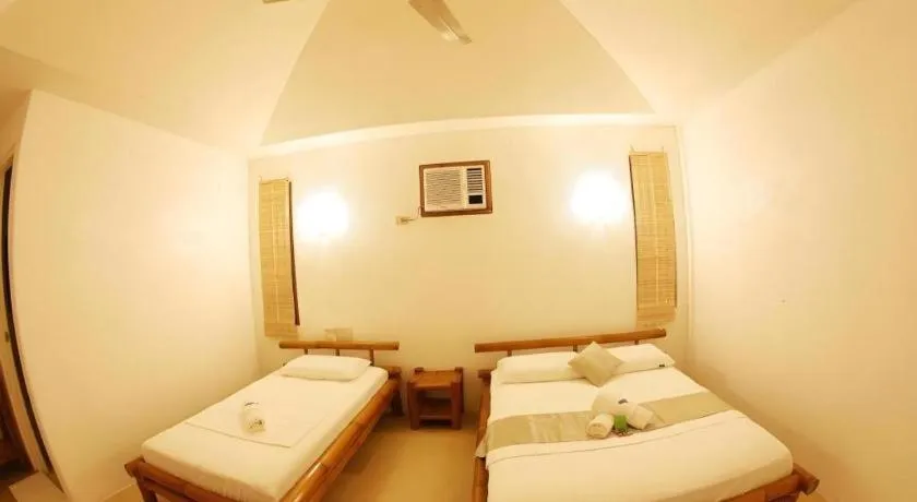 Bed in Elysia Beach Resort