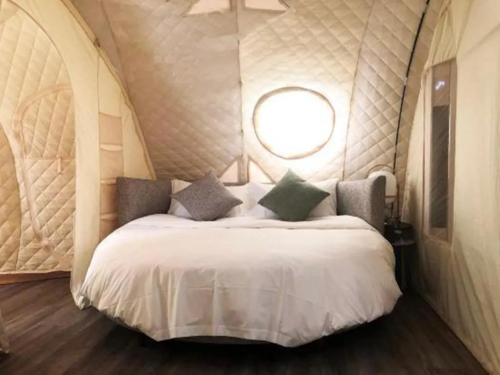 Bed in The Mulian Urban Resort Hotels Huadu