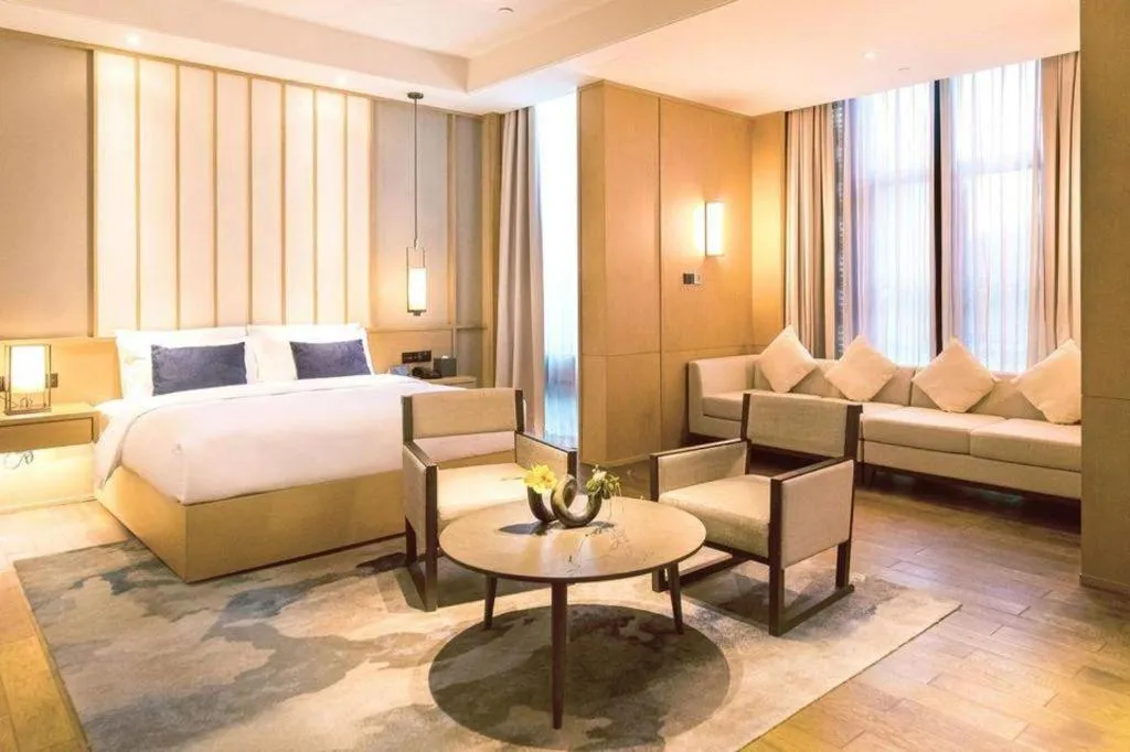 Bed in The Mulian Urban Resort Hotels Huadu