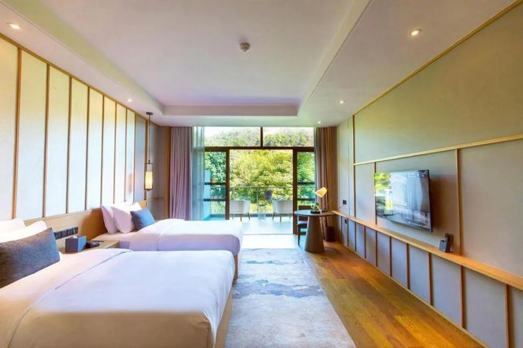 Bed in The Mulian Urban Resort Hotels Huadu