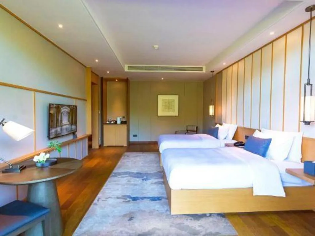 Bed in The Mulian Urban Resort Hotels Huadu