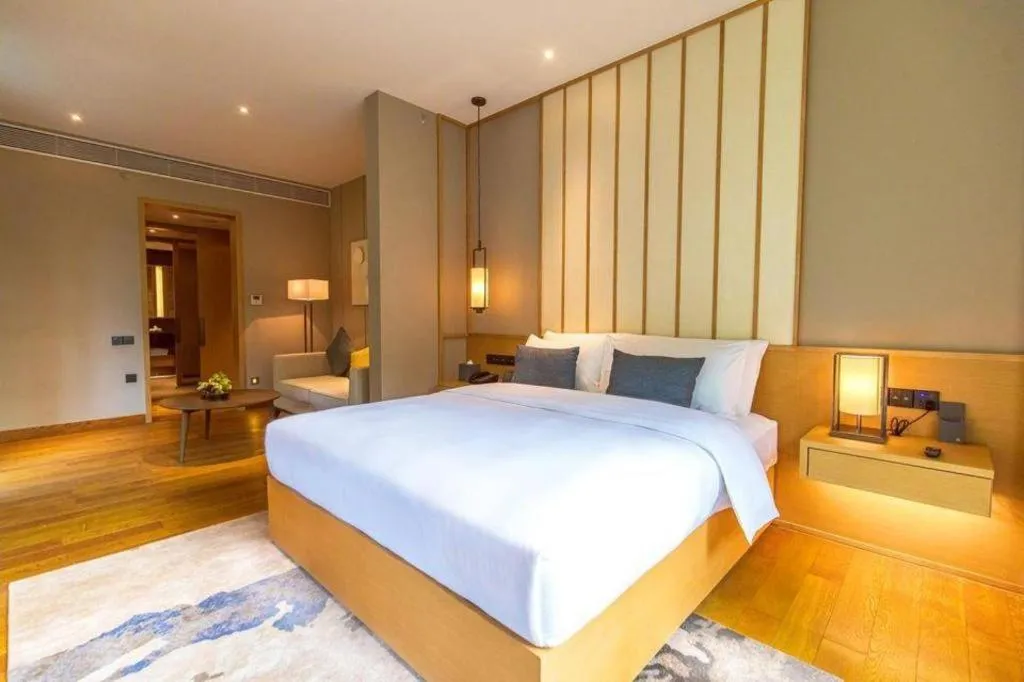 Bed in The Mulian Urban Resort Hotels Huadu