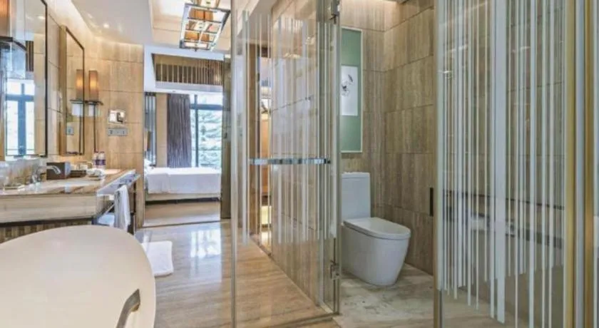 Bed in The Mulian Urban Resort Hotels Huadu