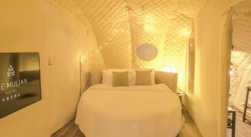 Bed in The Mulian Urban Resort Hotels Huadu