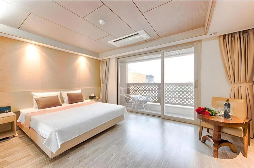 Bed in Richell Hotel