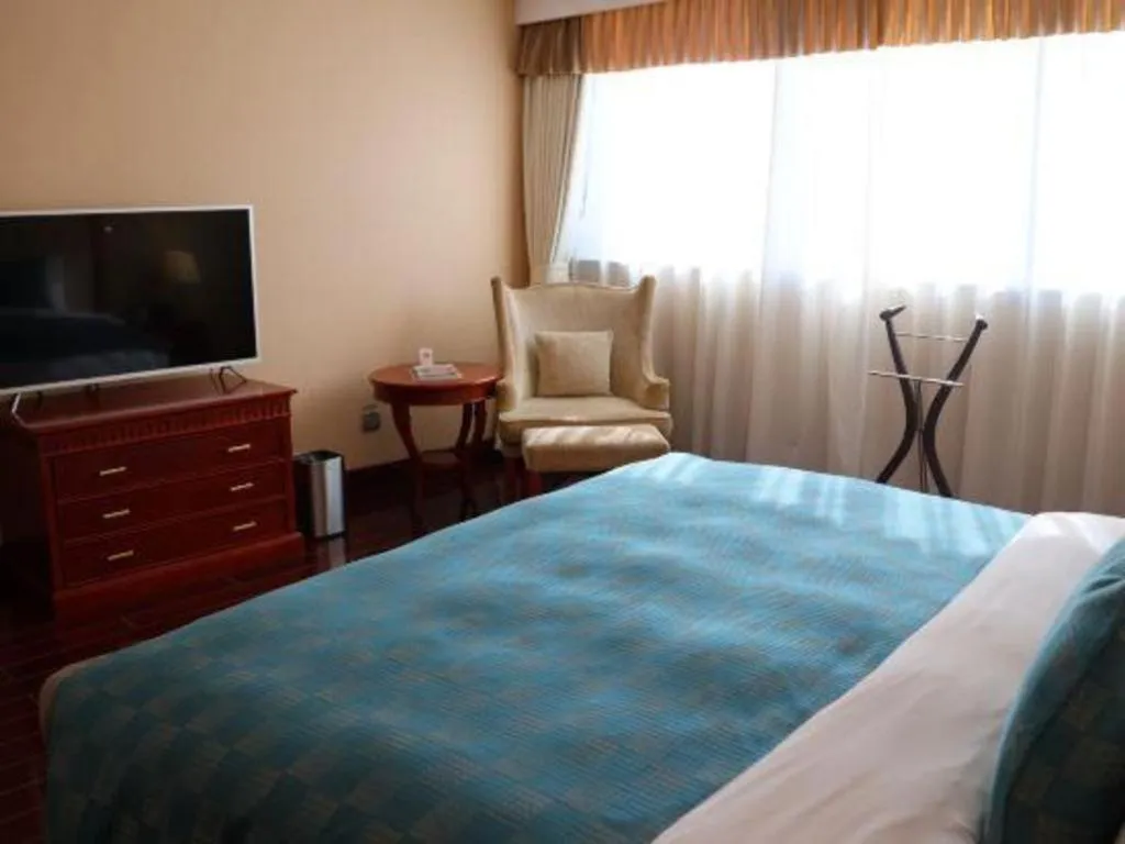 Bed in Jianguo Garden Hotel