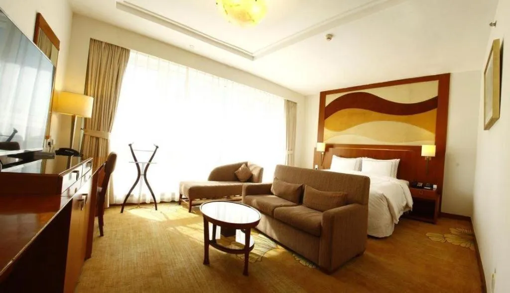 Bed in Jianguo Garden Hotel