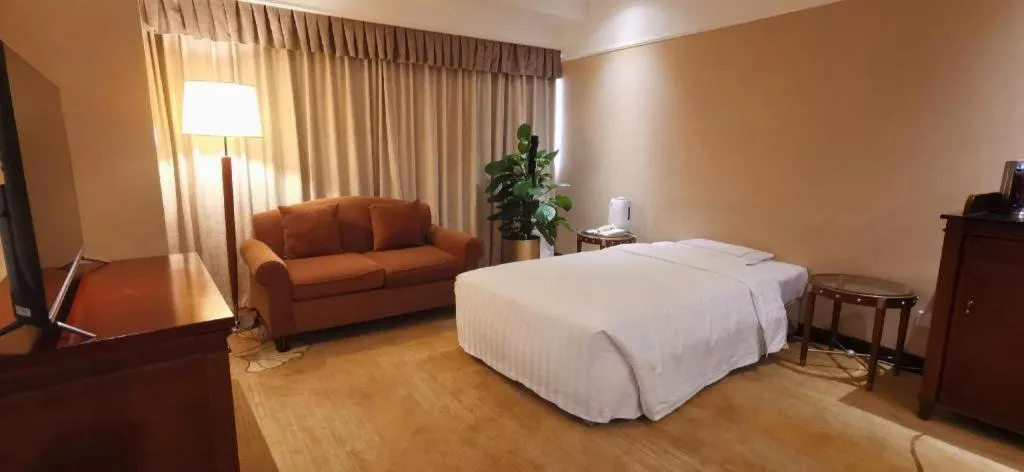 Bed in Jianguo Garden Hotel