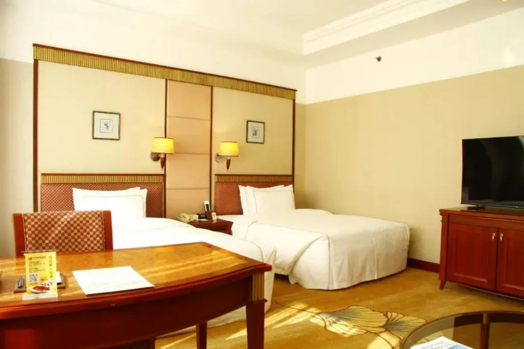 Bed in Jianguo Garden Hotel
