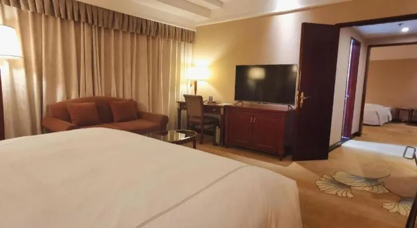 Bed in Jianguo Garden Hotel