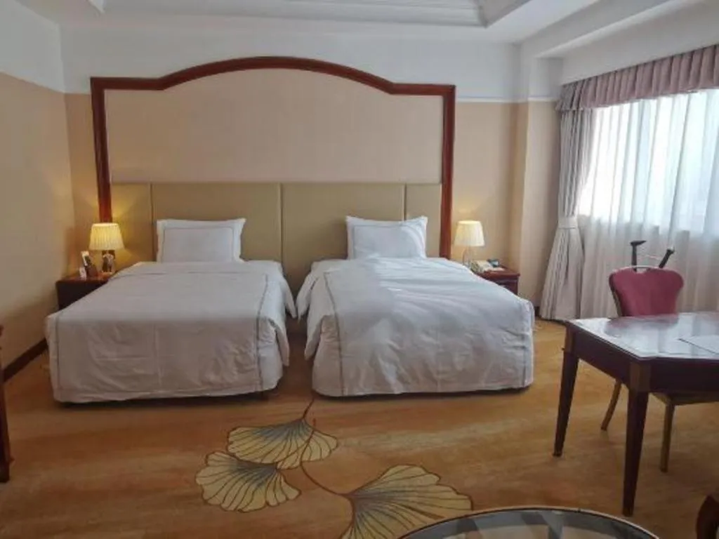 Bed in Jianguo Garden Hotel
