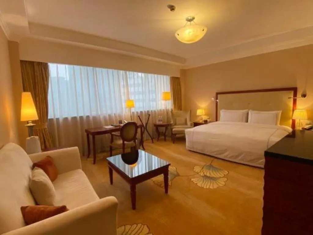 Bed in Jianguo Garden Hotel