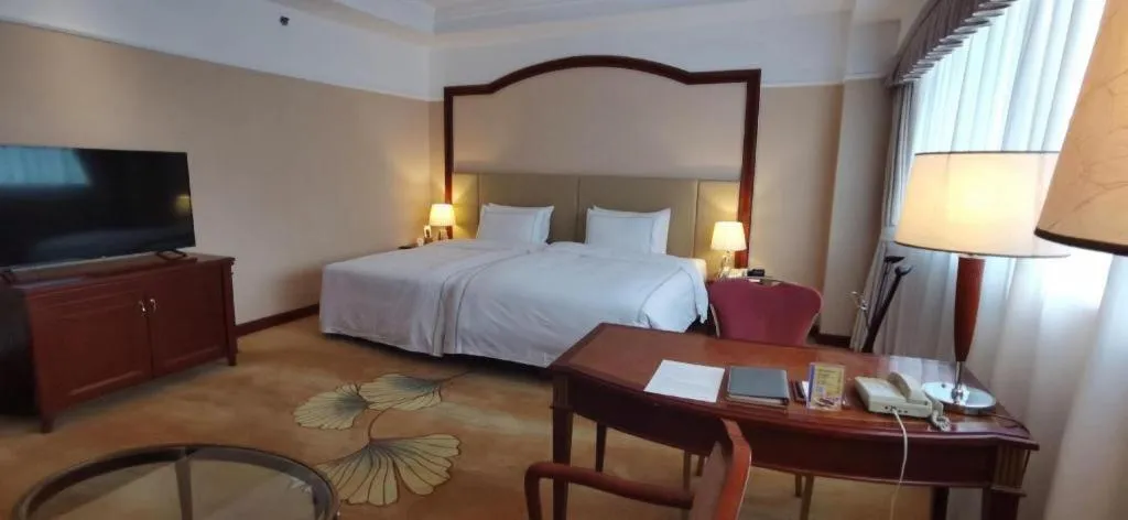 Bed in Jianguo Garden Hotel