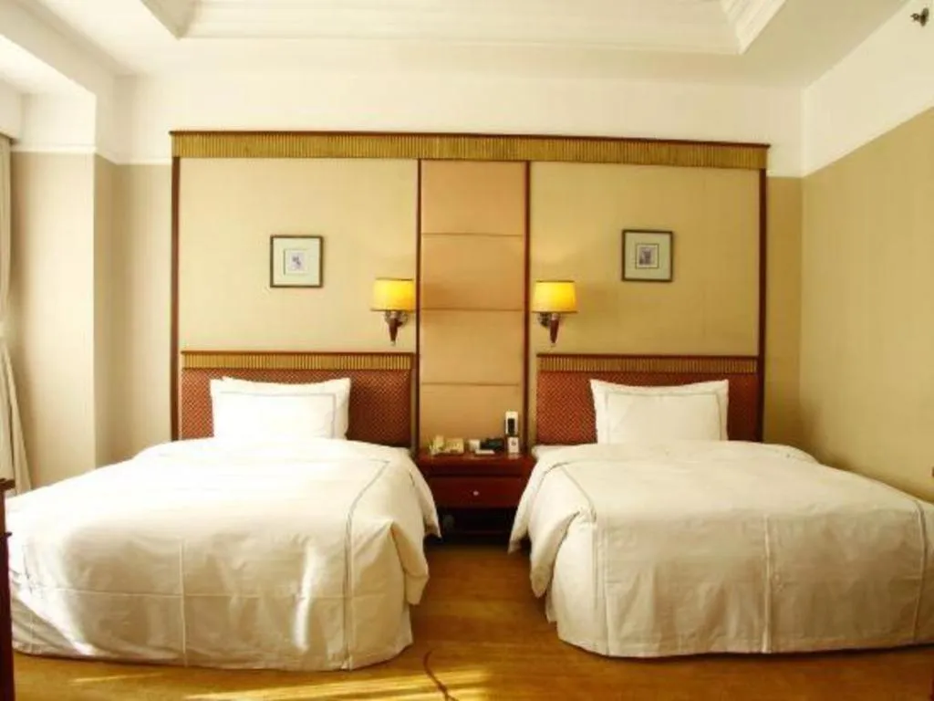 Bed in Jianguo Garden Hotel