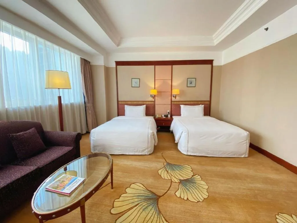 Bed in Jianguo Garden Hotel